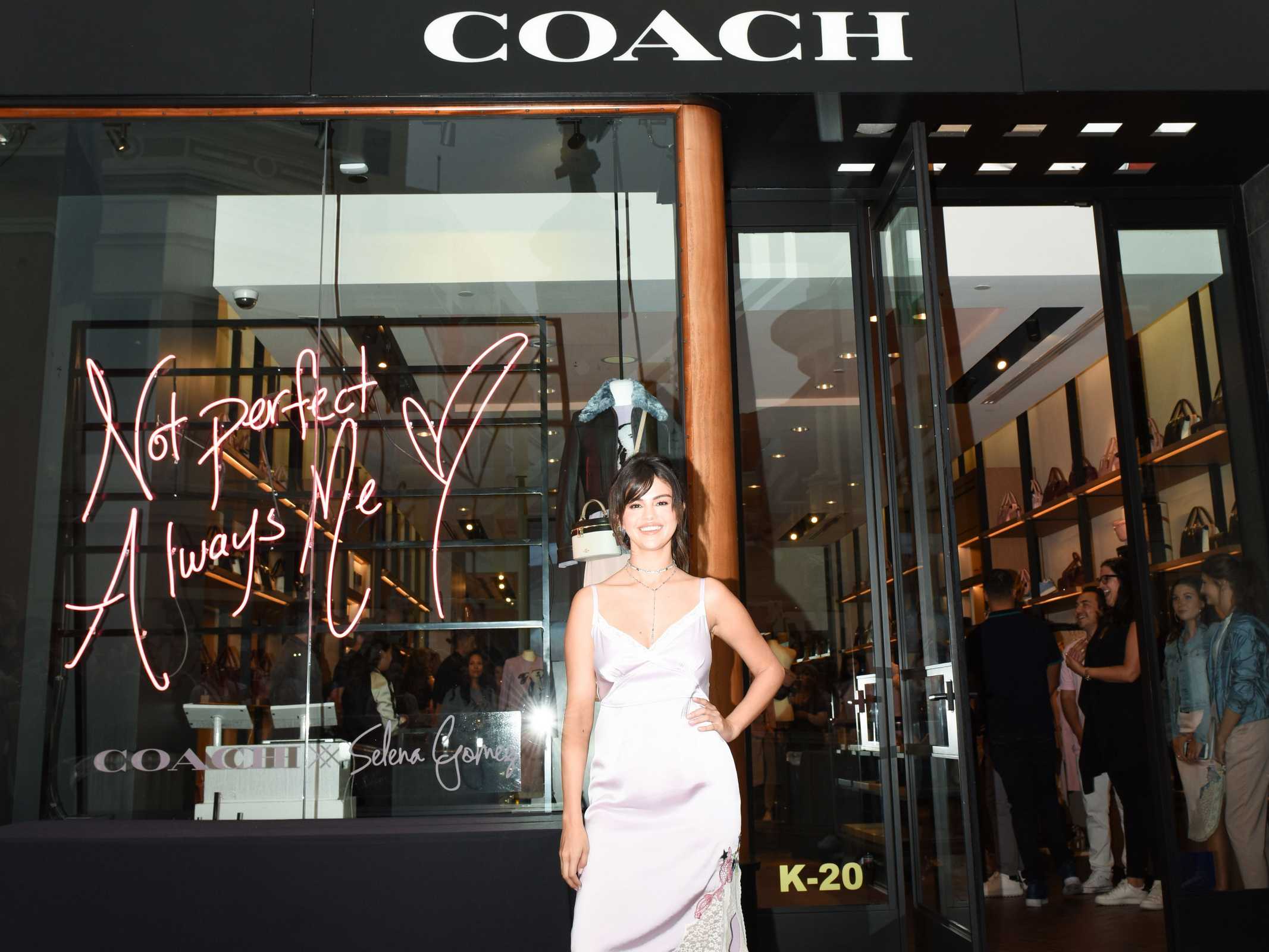 Coach_Hosts_Meet_2B_Greet_with_Selena_Gomez_at_The_Grove_-_September_5-03~0.jpg