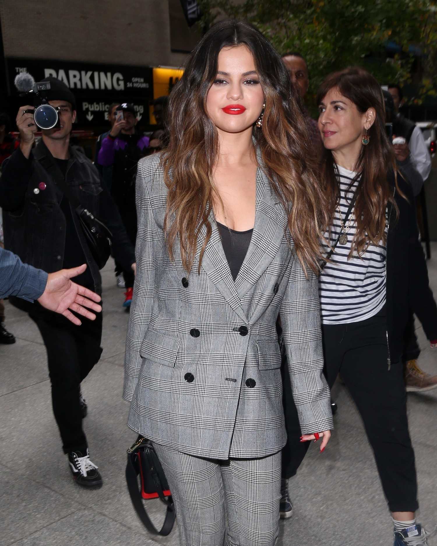 Selena_Gomez_-_Arriving_to_IHeartRadio_in_New_York_City2C_10282019-07.jpg