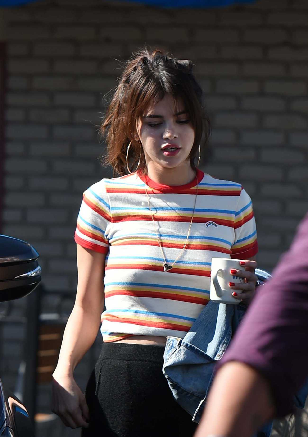 Selena_Gomez_-_At_IHOP_in_Encino2C_CA2C_on_February_7-01.jpg
