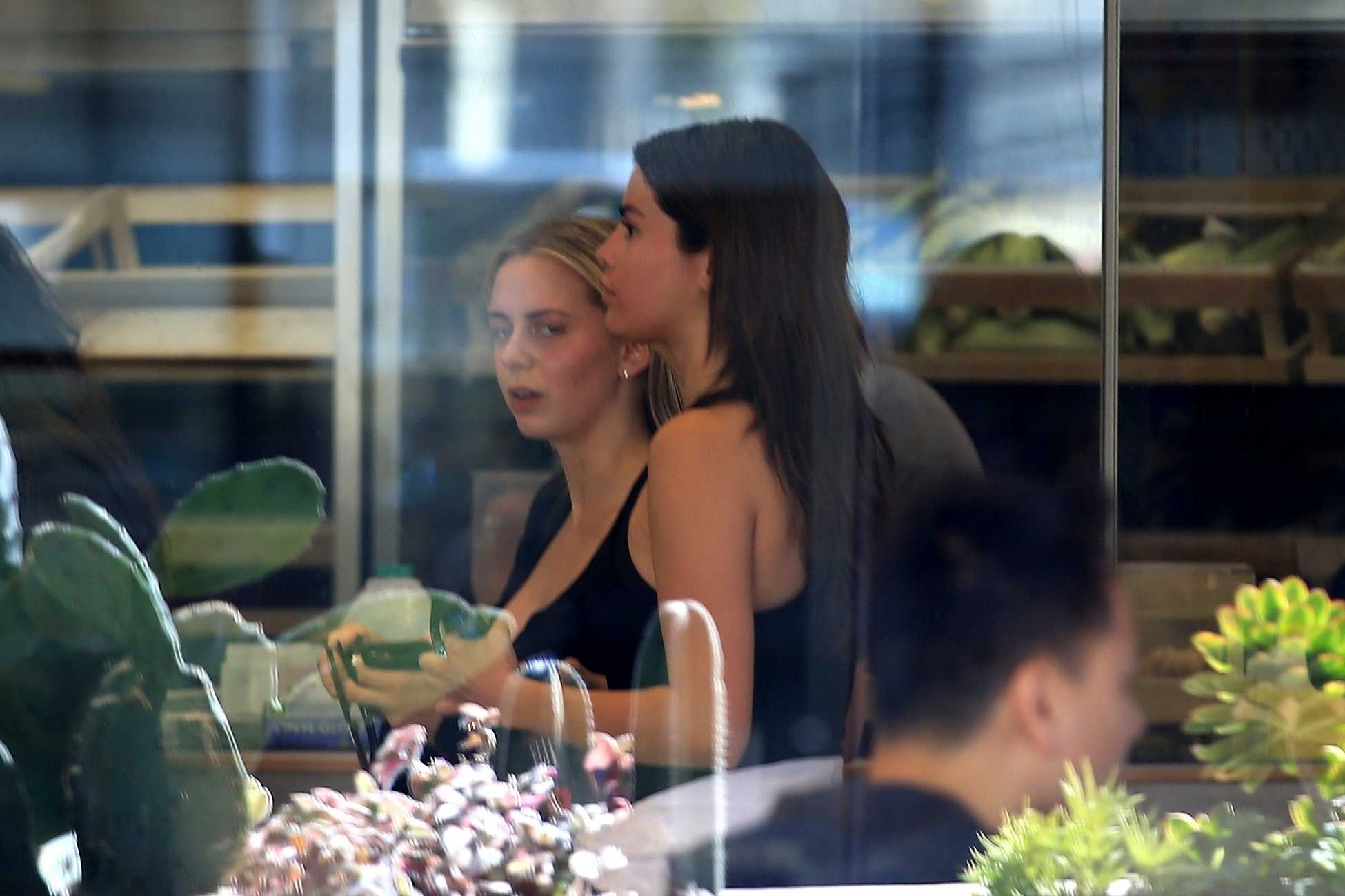 Selena_Gomez_-_At_Sweetgreen_and_Tocoya_restaurant_on_February_282C_2018-01.jpg