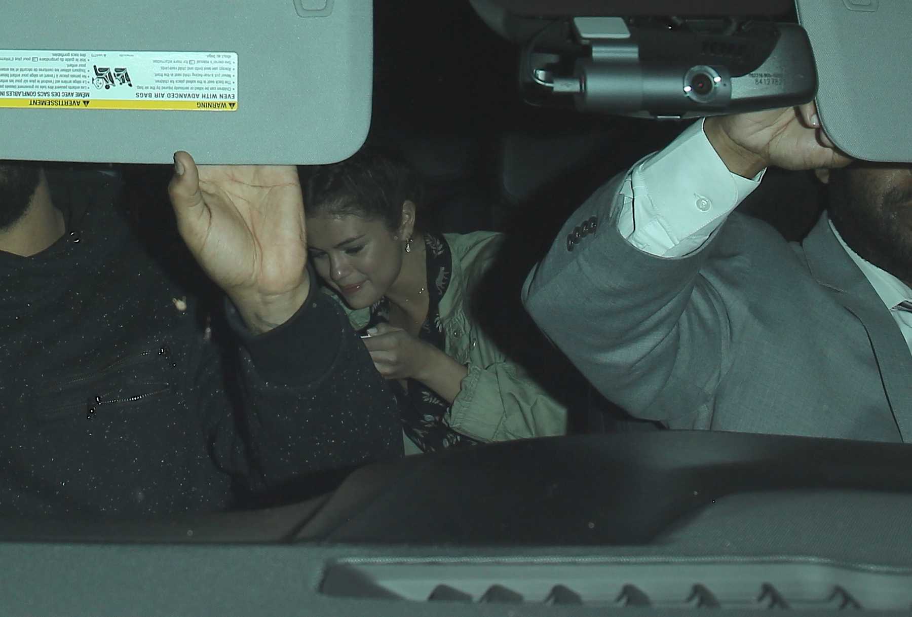 Selena_Gomez_-_Has_a_sushi_date_with_The_Weeknd_at_Matsuhisa_in_LA_on_April_22-01.jpg