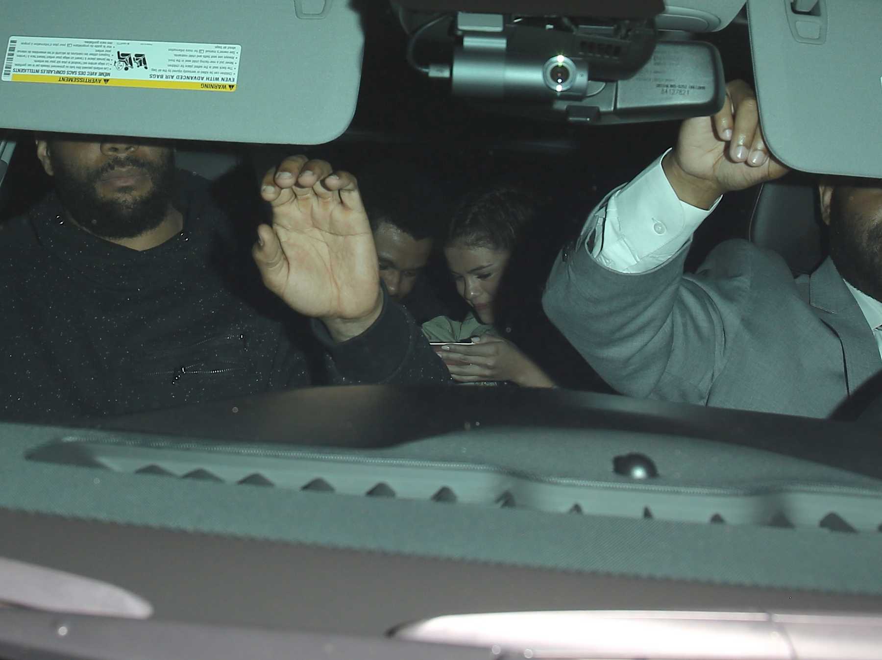 Selena_Gomez_-_Has_a_sushi_date_with_The_Weeknd_at_Matsuhisa_in_LA_on_April_22-03.jpg