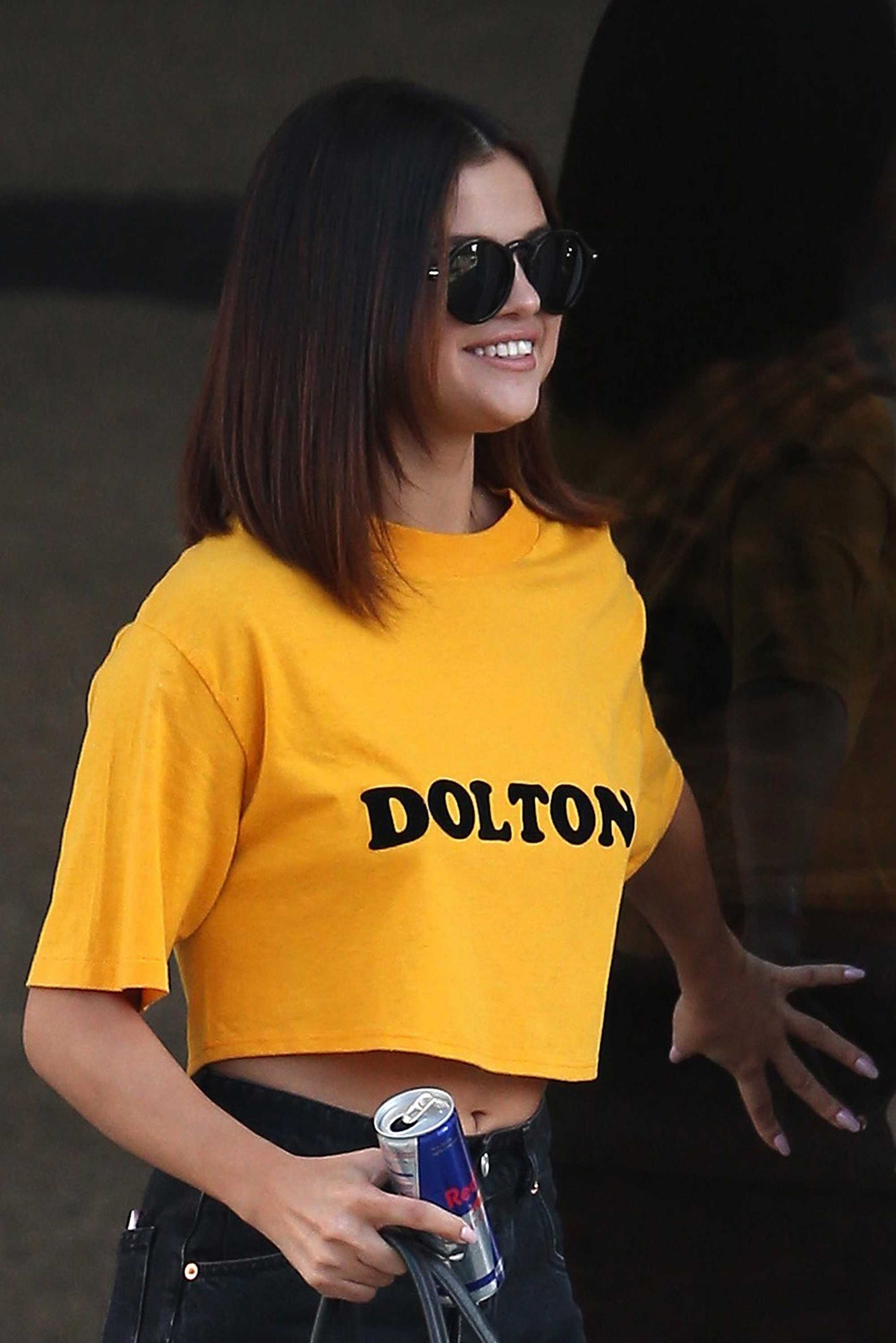 Selena_Gomez_-_Leaves_a_Shamrock_Tattoo_in_Hollywood2C_CA_on_April_9-06.jpg