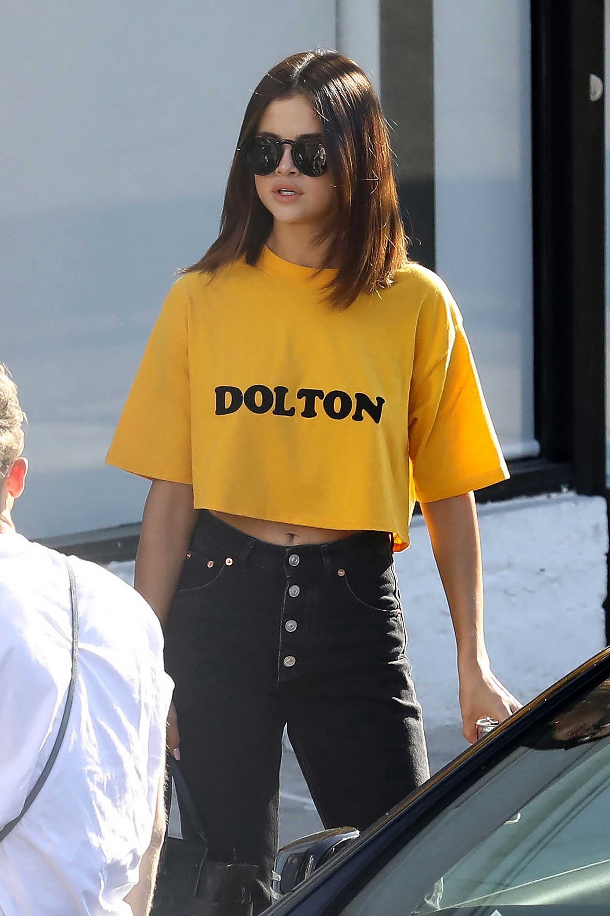 Selena_Gomez_-_Leaves_a_Shamrock_Tattoo_in_Hollywood2C_CA_on_April_9-14.jpg