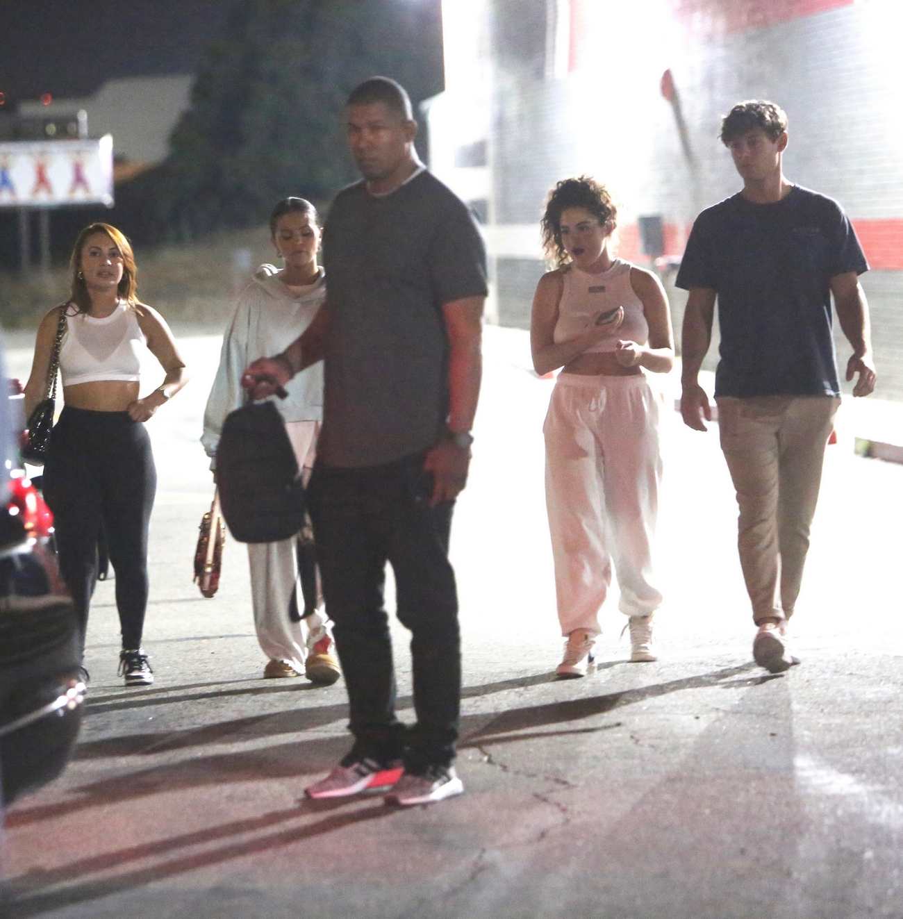 Selena_Gomez_-_Seen_leaving_a_bowling_alley_with_Francia_Raisa_in_Studio_City_August_142C_202306.jpg