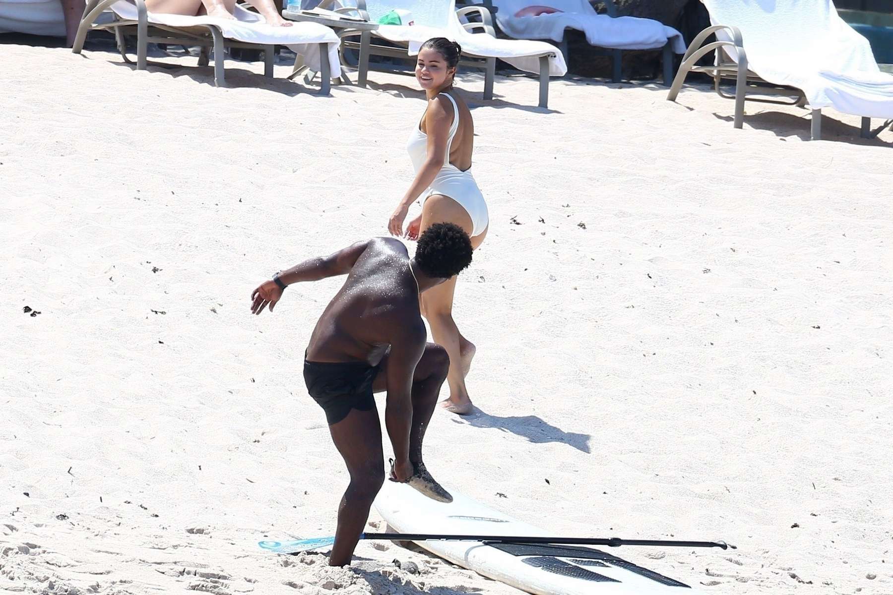 Selena_Gomez_-_Wears_a_white_swimsuit_at_a_beach_in_Punta_Mita2C_Mexico_July_12C_2019-32.jpg