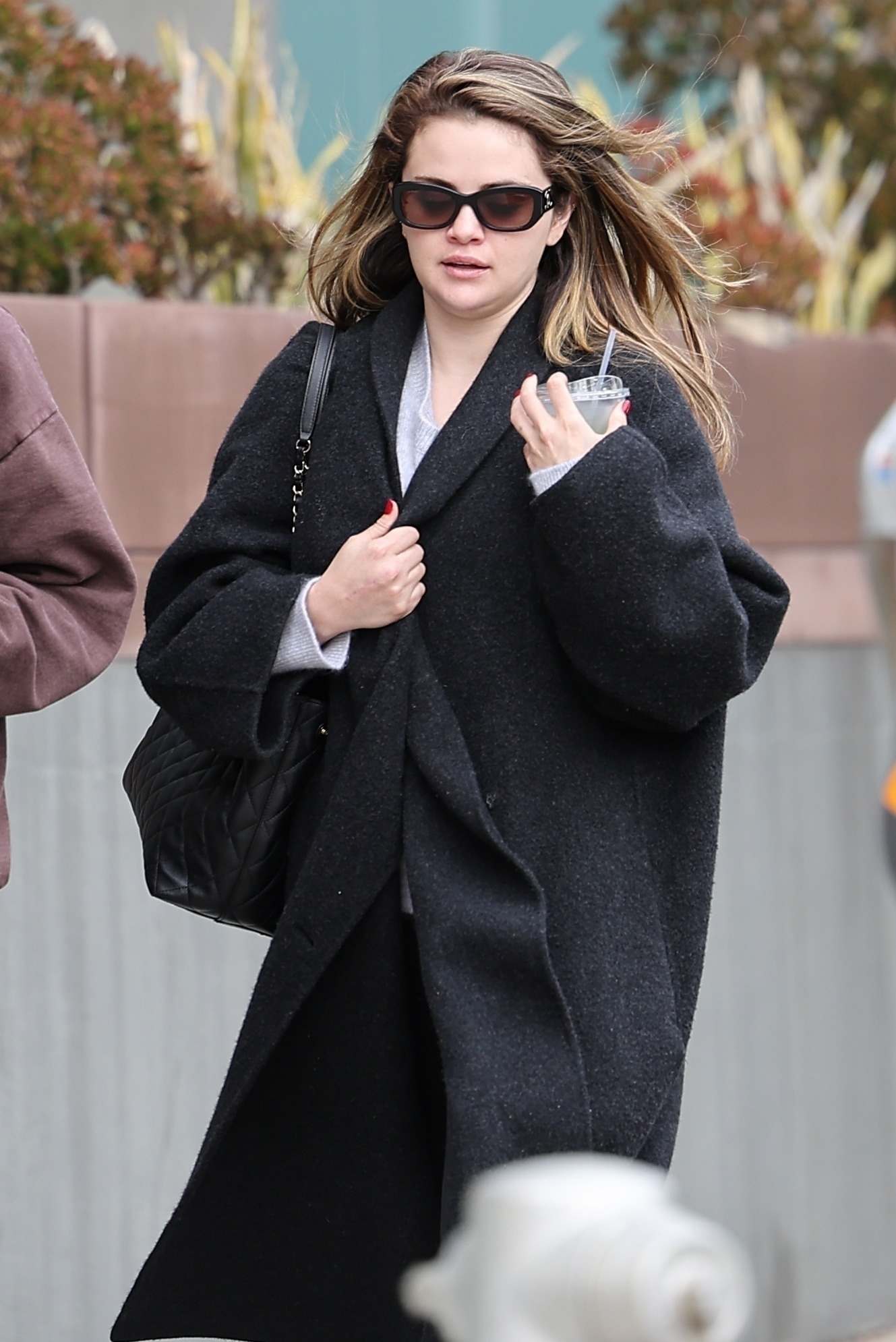 Selena_Gomez_-_at_Kiyono_Sushi_Bar_after_jewelry_shopping_in_Beverly_Hills2C_California__1219202306.jpg
