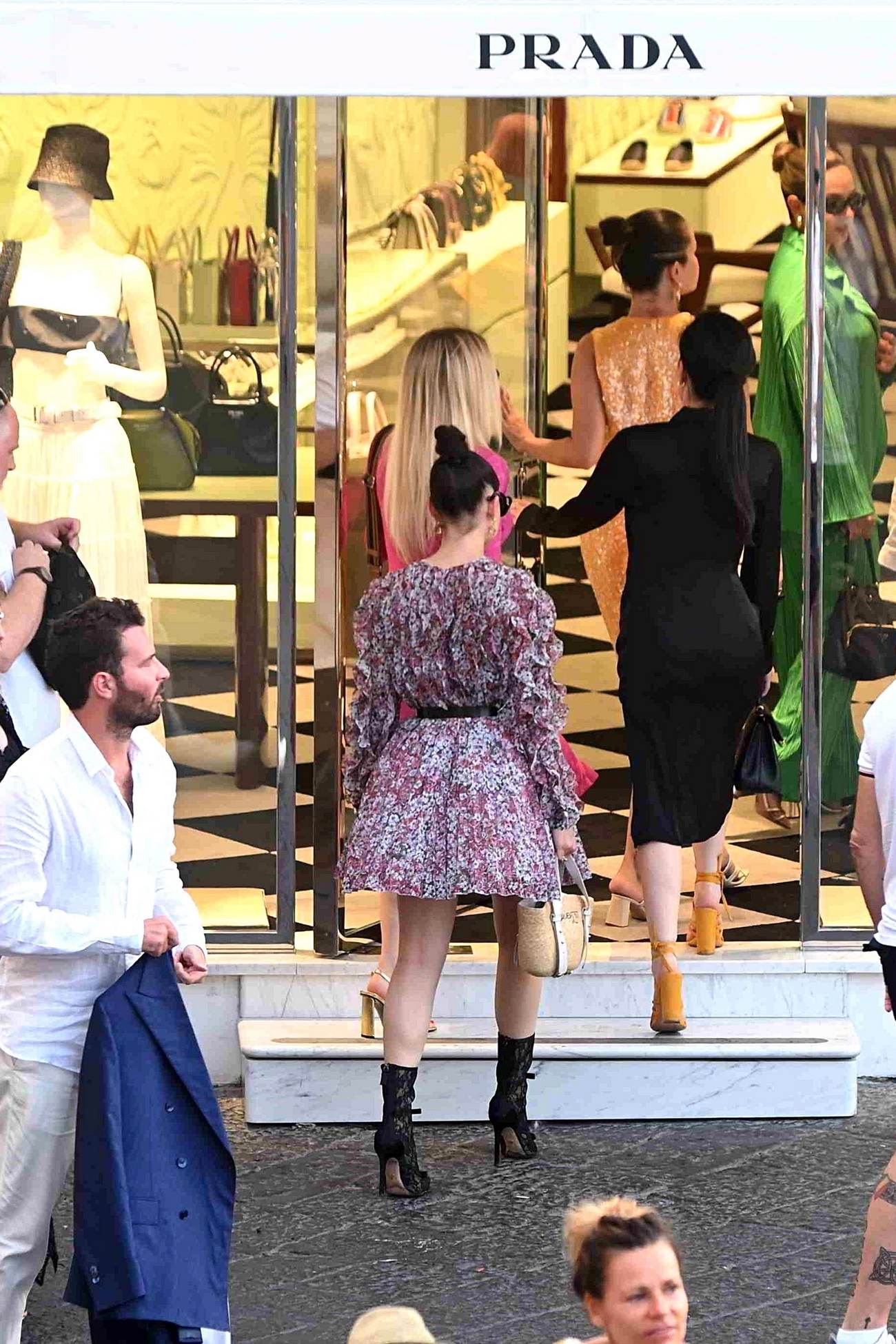 Selena_Gomez_and_Sofia_Carson_-_Seen_out_on_a_shopping_trip_in_Capri_August_32C_202203.jpg