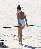 Selena_Gomez_-_Wears_a_white_swimsuit_at_a_beach_in_Punta_Mita2C_Mexico_July_12C_2019-26.jpg