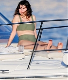 Selena_Gomez_-_stuns_as_she_soaks_up_the_sun_in_a_green_bikini_in_Hawaii2C_HI__12312019-04.jpg